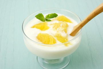 Fresh yogurt with orange and mint