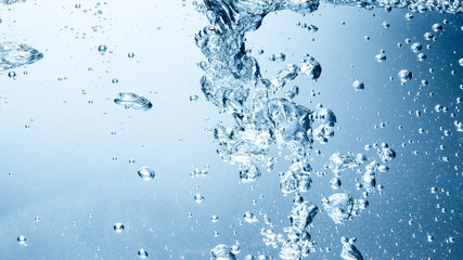 Blue water wave and bubbles to clean drinking water