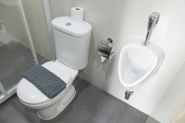 Clean and white water closet in a bathroom
