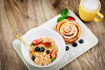 Healthy breakfast on wooden background