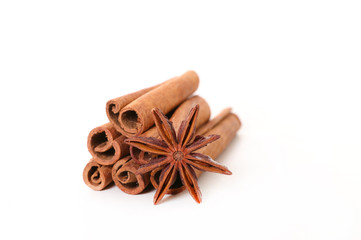 cinnamon and anise isolated on white