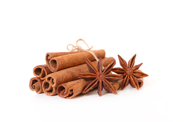cinnamon and anise isolated on white