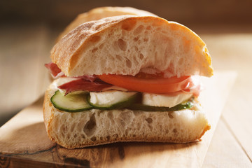 italian sandwich with speck and mozzarella