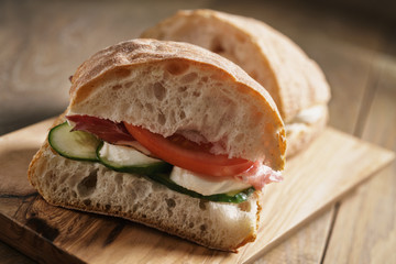 italian ciabatta sandwich with speck and mozzarella