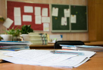 Checking homework in teacher's room