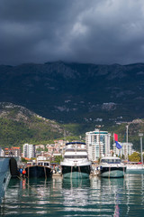 Fototapeta na wymiar Dock for boats and yachts in Budva, Montenegro