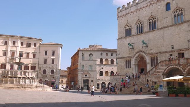 Panoramic shot of Perugia main square with palace and fountain, Italy
