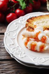 Italian antipasto with shripms and white wine