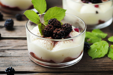 Homemade dessert with blackberry and cream