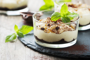 Sweet homemade dessert with cream and chocolate