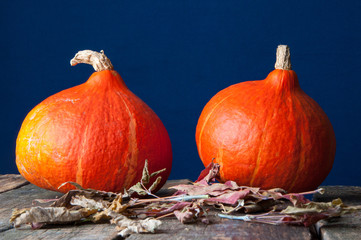 Pumpkins on an old wooden table