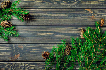 Christmas Fir Tree On Wooden Background With cones