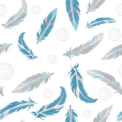 Seamless pattern with feathers and ornaments