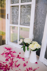 Wedding ceremony decoration. Table flowers decor. wedding arch decorated with flowers.