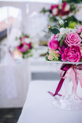 Wedding ceremony decoration. Table flowers decor. wedding arch decorated with flowers.