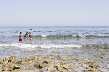 Children in the water of the Mediterranean sea