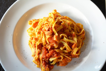 Italian food.Tagliatelle al pomodoro.