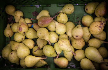 Fruits in a supermarket. Pears.