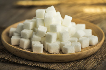 white sugar in a wooden plate