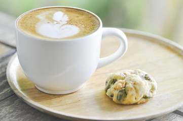 hot cappuccino coffee  and cookie
