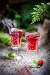 Sweet liqueur with alcohol and wild strawberry