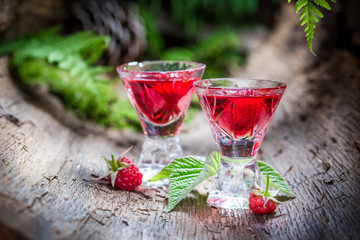 Sweet raspberries liqueur made of fruits and alcohol