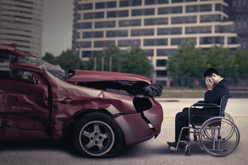 Fototapeta na wymiar Disabled person and damaged car
