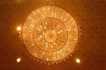 Close-up of a beautiful crystal chandelier.Close-up of a beautif