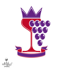 Elegant glass of wine with grapes cluster, decorative ribbon and