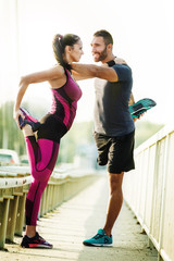 Exercising Outdoors. Happy Couple.Sports, Health and Fitness.