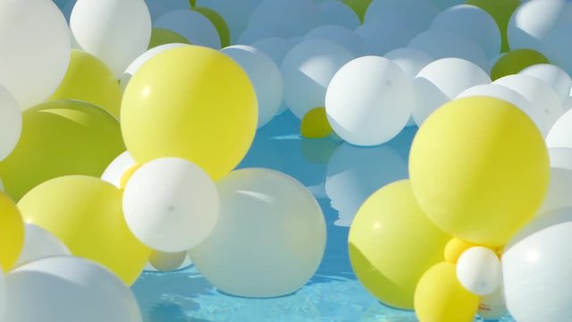 Yellow and white Balloons floating on the water