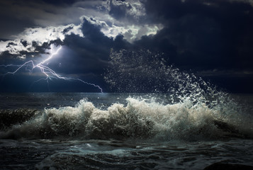 dark ocean storm with lgihting and waves at night © Andrey Kuzmin