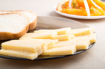 Snacks for home breakfast - slices of cheese and bread