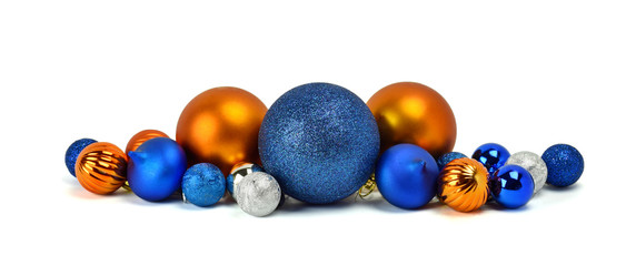 A pile of Christmas ornaments, colorful balls. / Isolated on whi