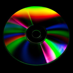CD and DVD disk on black background