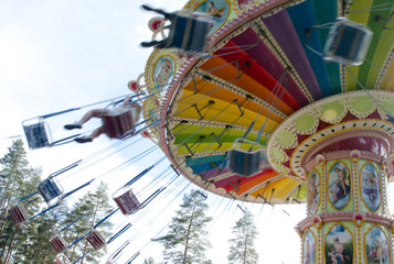 Kouvola, Finland 7 June 2016 - Ride Swing Carousel in motion in amusement park Tykkimaki
