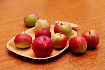 Apples on the wooden table