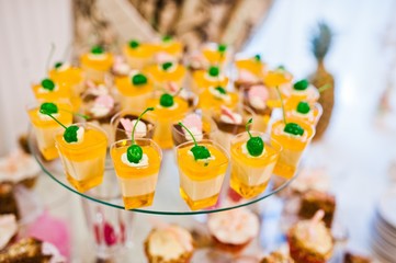 Fototapeta na wymiar Wedding reception, table of cakes and sweet