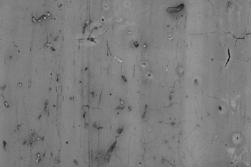 Wall fragment with scratches and cracks