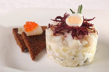 fish salad with potatoes and egg