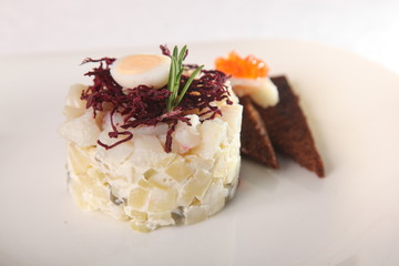 fish salad with potatoes and egg