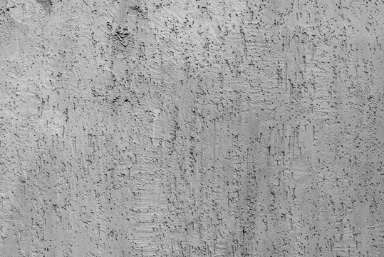 Wall fragment with scratches and cracks