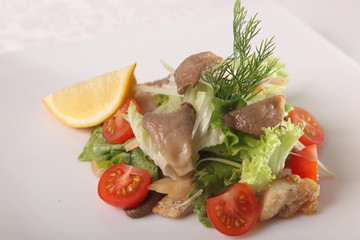 Salad with mushrooms and tomatoes