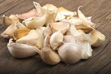 Group of garlic cloves on the wood