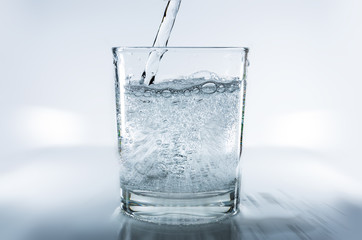 fresh, sparkling mineral water in a glass
 - obrazy, fototapety, plakaty