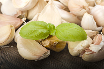 Group of garlic cloves on the wood