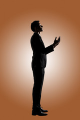 Asian businessman praying