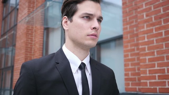 Close Up of Walking Man in Suit, Outside Office