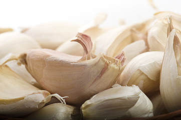 wicker basket with group of garlic cloves