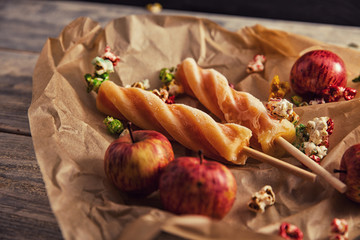 peach yellow and orange ice cream on wooden table